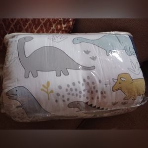 Nojo navy little dinosaur 8 PC crib bedding set in original packaging